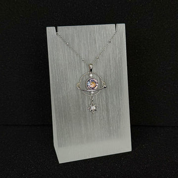 The 'Dimensional Amethyst' variant of Future Spark's Ishtar Planet Pendant, featuring a mesmerizing spherical gemstone that displays a delicate interplay of pink and underlying violet-purple tones, giving it a crystal-like depth and dimension, all within a futuristic silver setting.