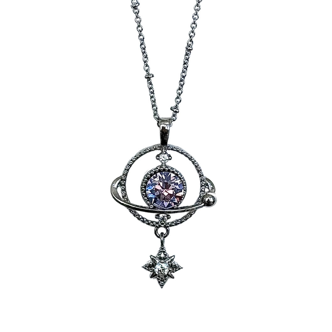 White background product shot of the Ishtar Planet Pendant by Future Spark, featuring a luminous, orb-like gemstone reminiscent of a distant planet, held by an organic, futuristic silver-toned structure.