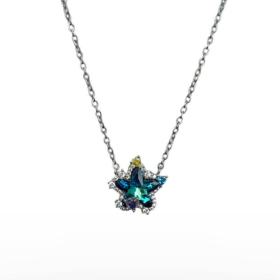 Product image of the Seren Star Necklace by Future Spark, highlighting its color-shifting iridescent stone and silver chain, on a white background.
