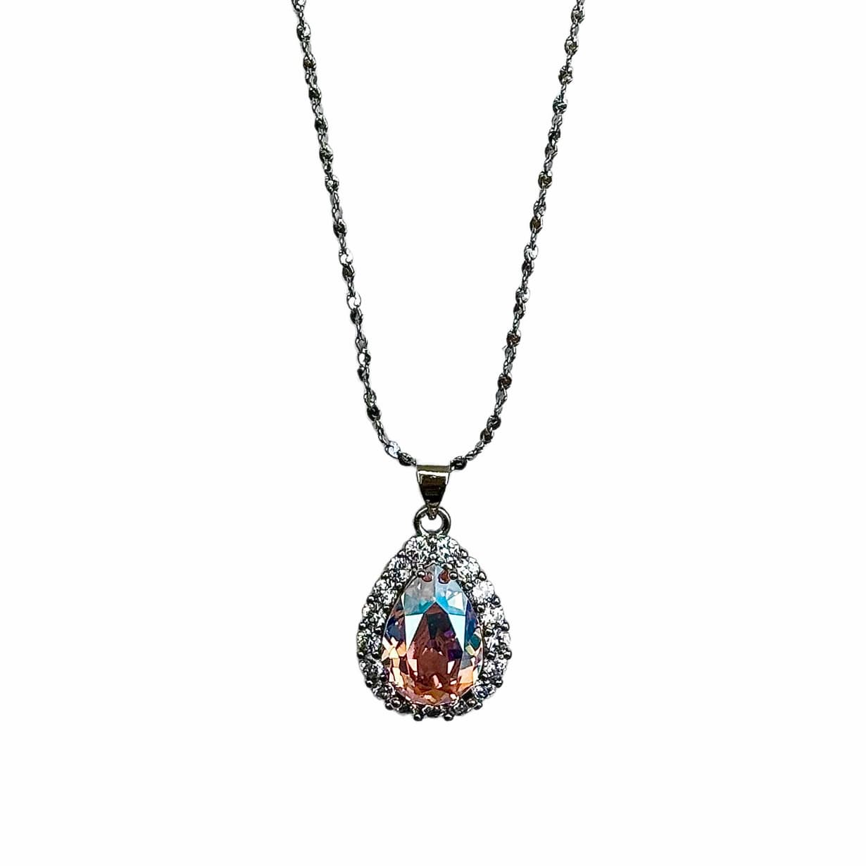 Product image of the Nyra Teardrop Starburst Necklace by Future Spark, highlighting its color-shifting iridescent stone, intricate starburst design, and silver chain, on a white background.